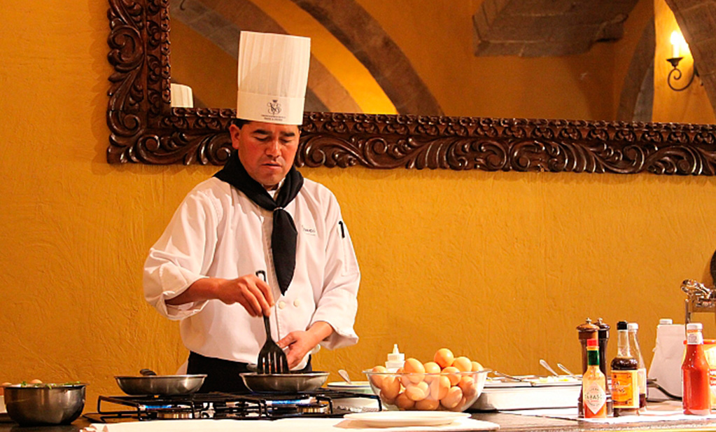 A chef prepares omelets to order